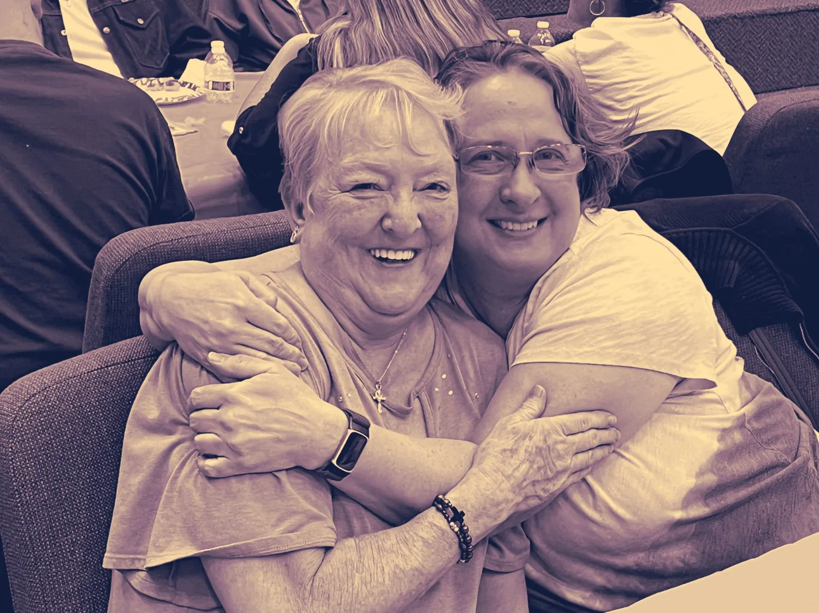 Two women from Sonrise sharing a hug